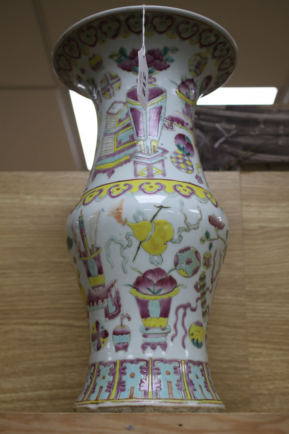 A Chinese famille rose hundred antiques vase, 19th century,